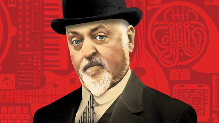 Bill Bailey wearing a top hat against a red background with graphic elements