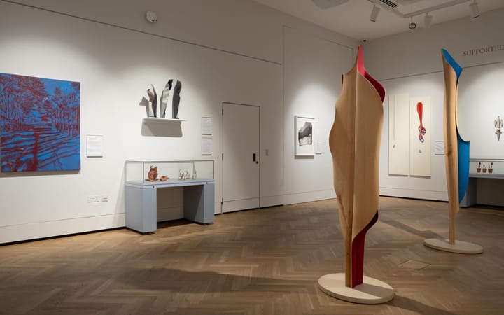 Keith Rand's twin wooden sculptures with crimson and blue interiors in Aberdeen Art Gallery